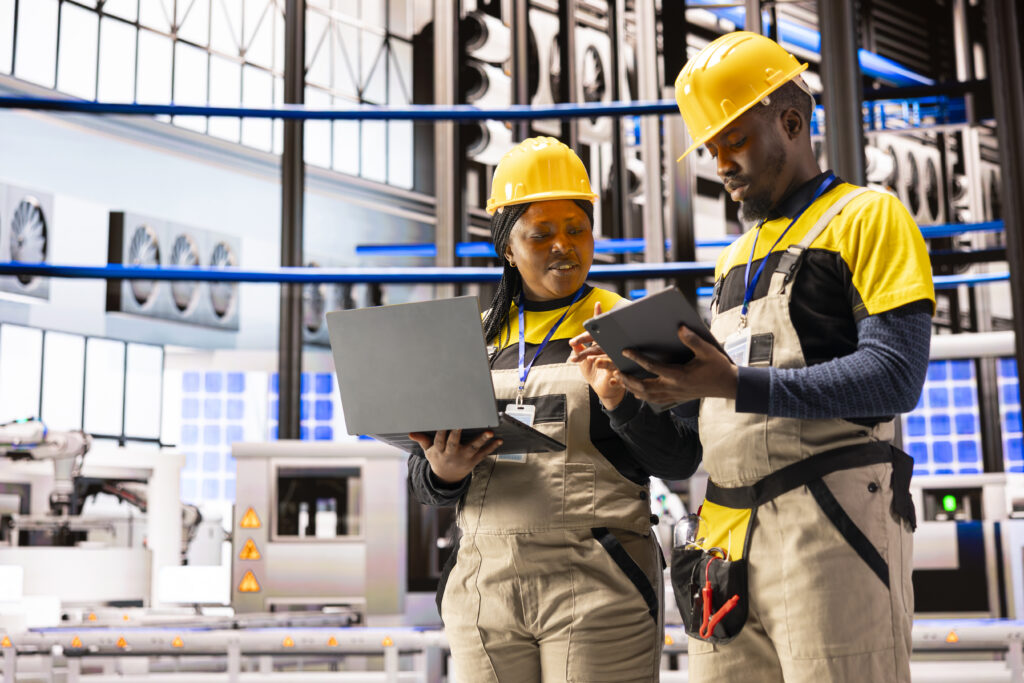 Engineers Optimizing Automated Factory Systems